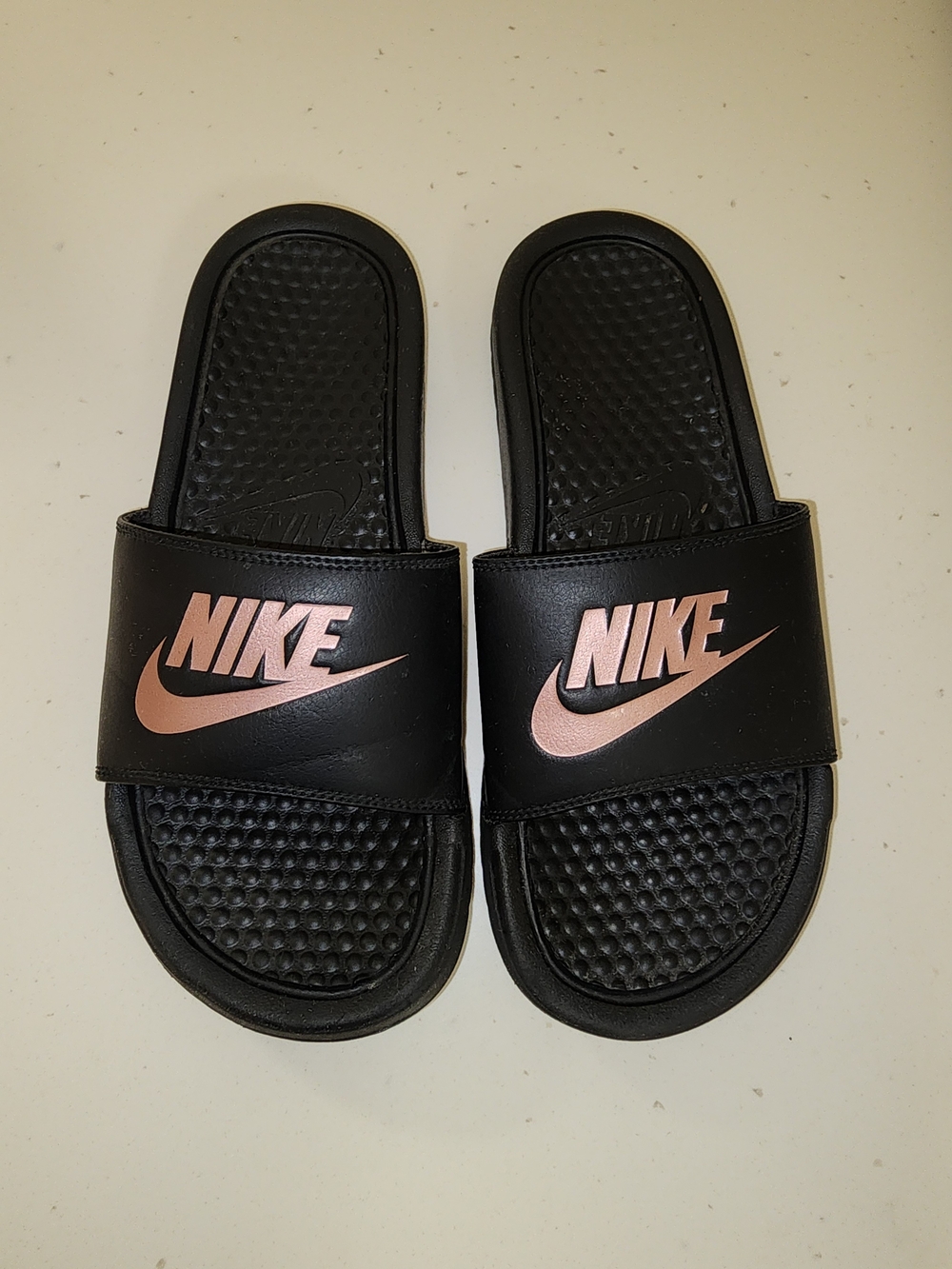 Nike Black Slide Sandals with Rose Gold Logo